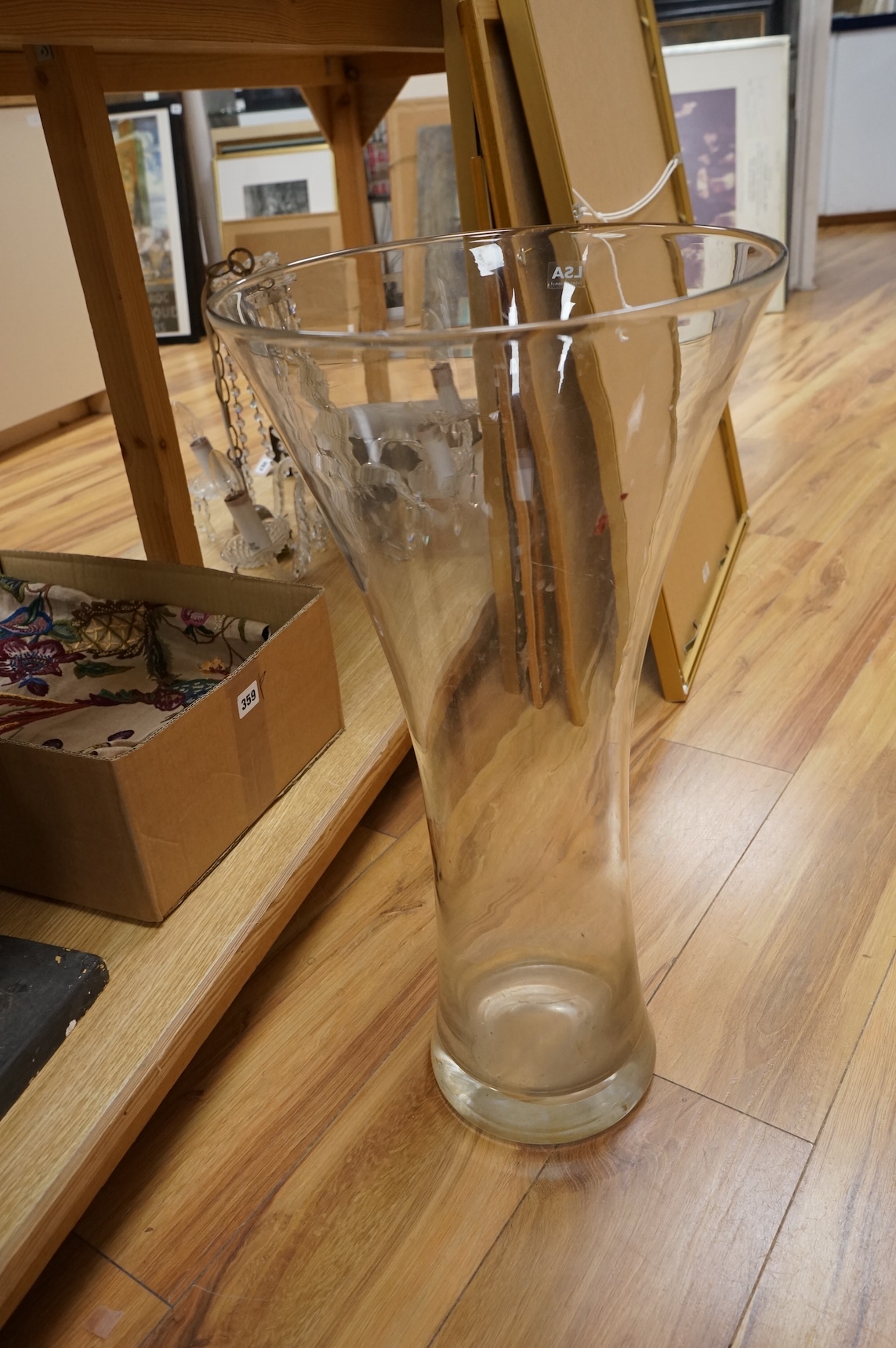 Three large glass vases, tallest 60.5cm